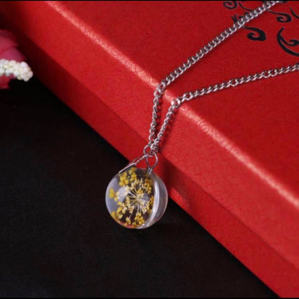 YELLOW CRYSTAL BALL NECKLACE.